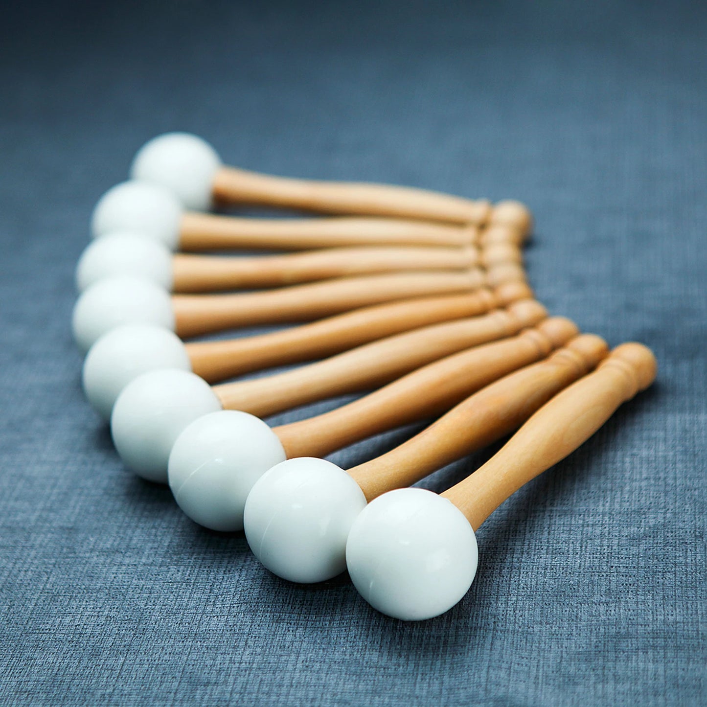 Rubber holders and rods for crystal singing bowls